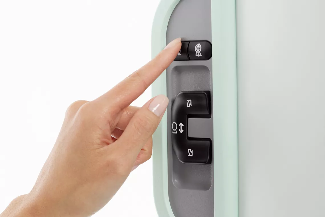 Manuella valknappar för att trycka in på vårdutrustningen