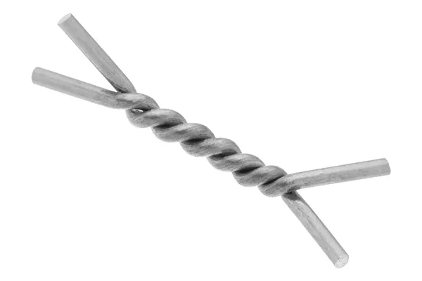 Biopsiplatsmarkör mot vit bakgrund